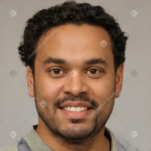 Joyful latino young-adult male with short  brown hair and brown eyes