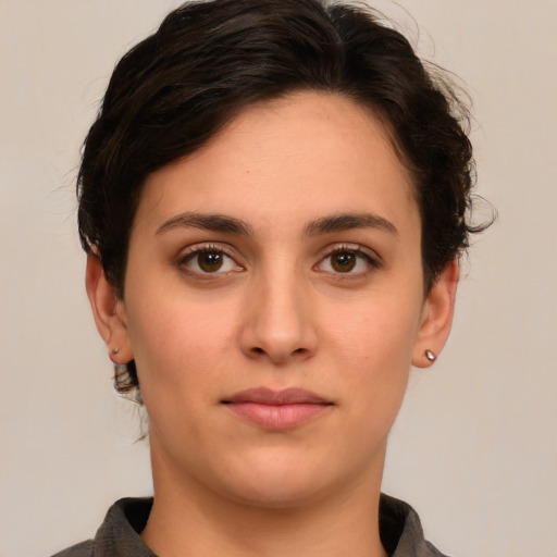 Neutral white young-adult female with short  brown hair and brown eyes