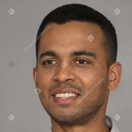 Joyful black young-adult male with short  black hair and brown eyes
