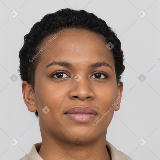 Joyful black young-adult female with short  black hair and brown eyes