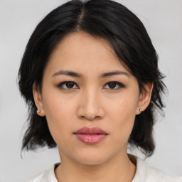 Neutral asian young-adult female with medium  black hair and brown eyes