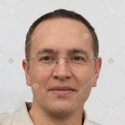 Joyful white adult male with short  brown hair and brown eyes