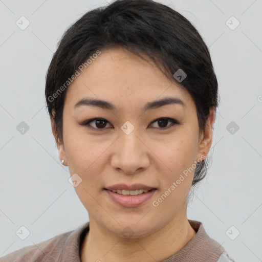 Joyful asian young-adult female with short  brown hair and brown eyes