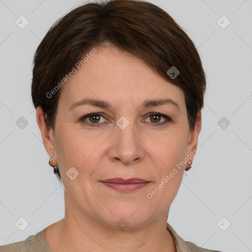 Joyful white adult female with short  brown hair and grey eyes