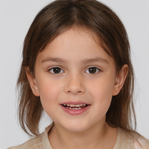 Joyful white child female with medium  brown hair and brown eyes