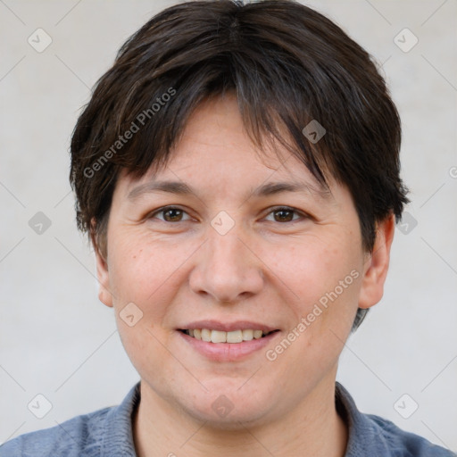 Joyful white adult female with short  brown hair and brown eyes