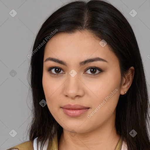 Joyful latino young-adult female with long  brown hair and brown eyes