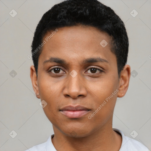 Joyful black young-adult male with short  black hair and brown eyes
