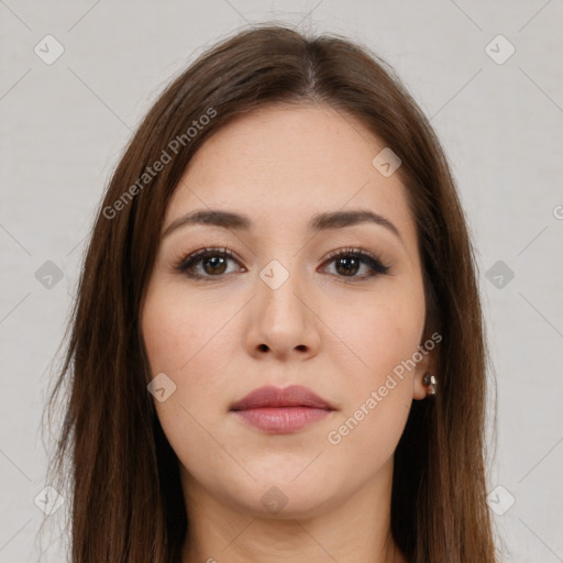 Neutral white young-adult female with long  brown hair and brown eyes