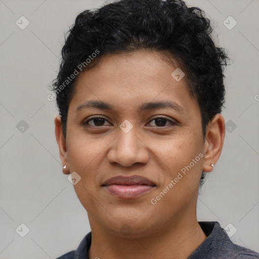 Joyful latino young-adult female with short  brown hair and brown eyes