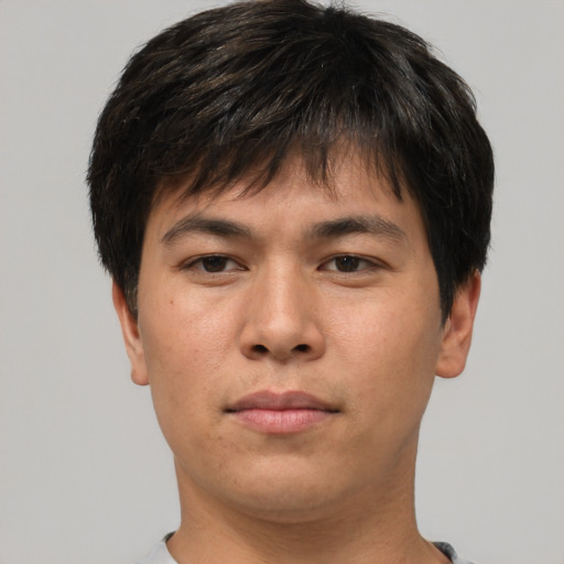 Neutral asian young-adult male with short  brown hair and brown eyes