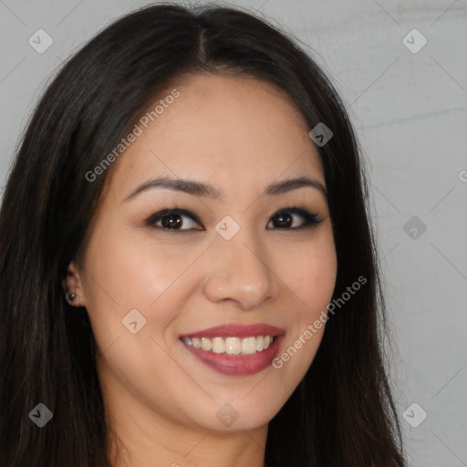 Joyful white young-adult female with long  brown hair and brown eyes