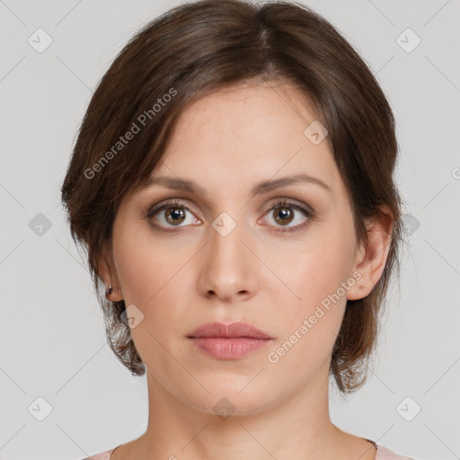 Neutral white young-adult female with medium  brown hair and brown eyes