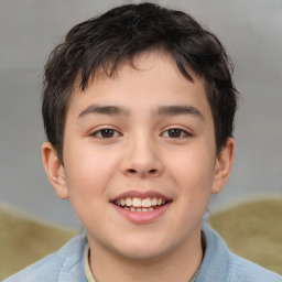 Joyful white child male with short  brown hair and brown eyes