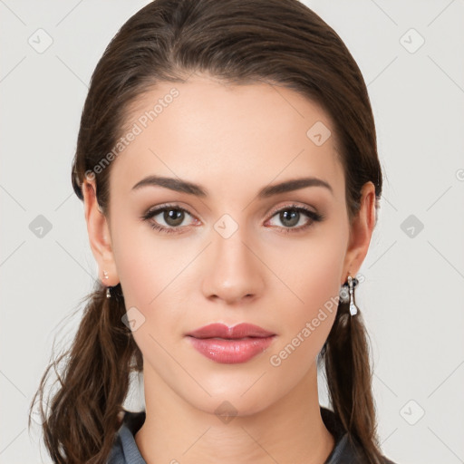 Neutral white young-adult female with long  brown hair and brown eyes