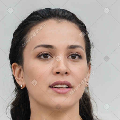 Joyful latino young-adult female with long  brown hair and brown eyes