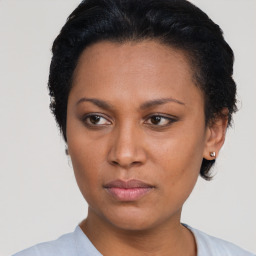 Neutral asian young-adult female with short  brown hair and brown eyes