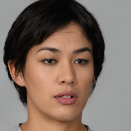 Neutral asian young-adult female with medium  brown hair and brown eyes