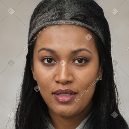 Joyful black young-adult female with long  black hair and brown eyes