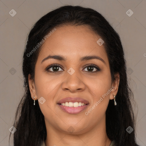 Joyful latino young-adult female with long  brown hair and brown eyes