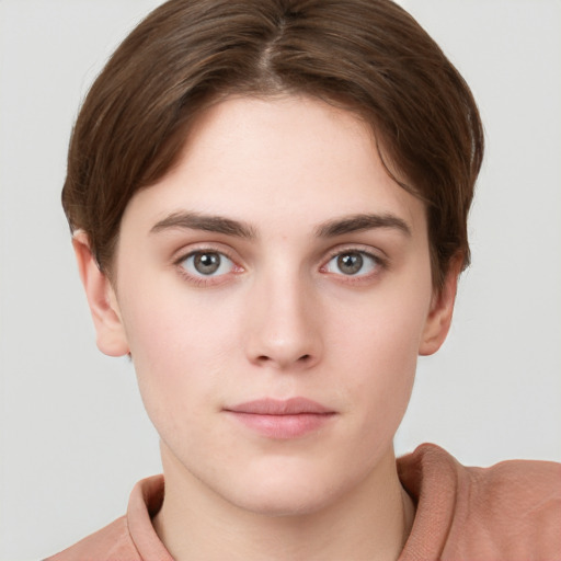 Neutral white young-adult female with short  brown hair and grey eyes