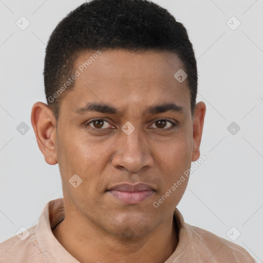 Joyful latino young-adult male with short  brown hair and brown eyes