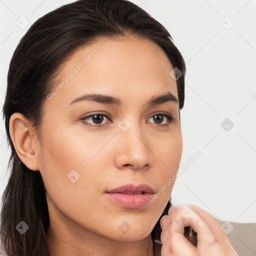 Neutral white young-adult female with long  brown hair and brown eyes