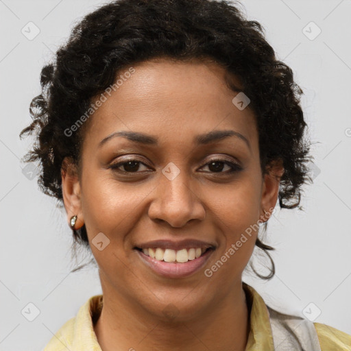 Joyful black young-adult female with short  brown hair and brown eyes