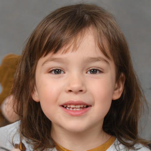 Joyful white child female with medium  brown hair and brown eyes