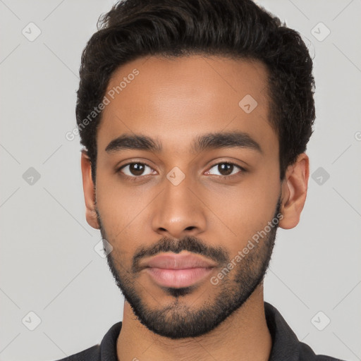 Neutral latino young-adult male with short  black hair and brown eyes