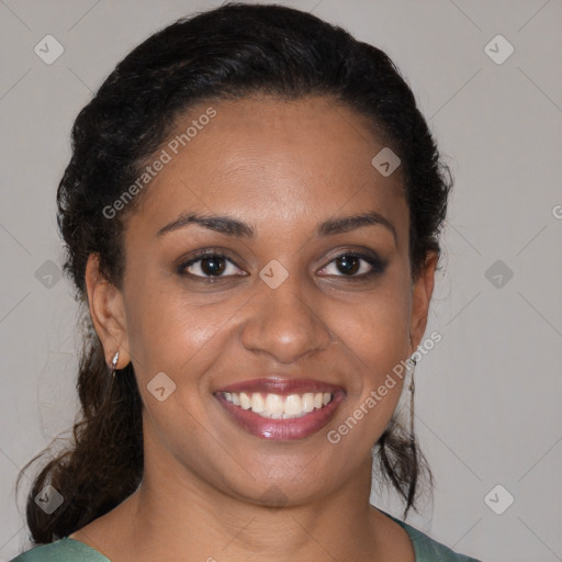 Joyful black young-adult female with medium  brown hair and brown eyes