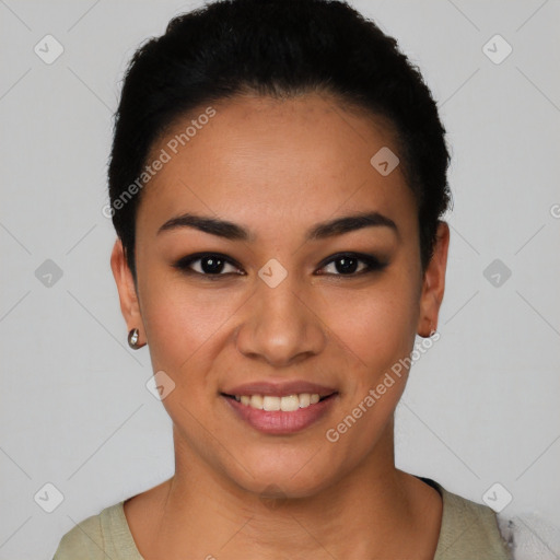 Joyful latino young-adult female with short  black hair and brown eyes