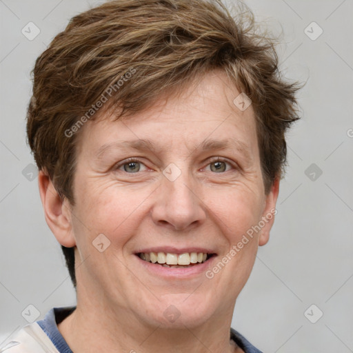 Joyful white adult male with short  brown hair and grey eyes