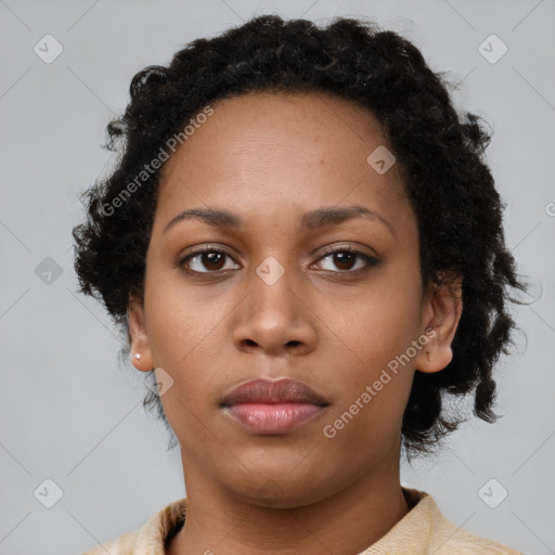 Neutral black young-adult female with short  brown hair and brown eyes