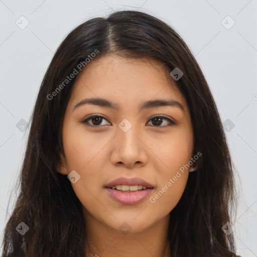 Joyful asian young-adult female with long  brown hair and brown eyes