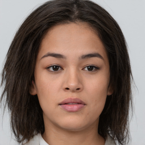 Neutral asian young-adult female with medium  brown hair and brown eyes