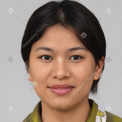 Joyful asian young-adult female with medium  brown hair and brown eyes