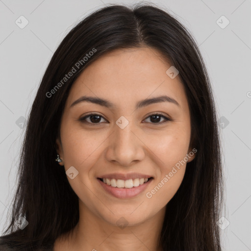 Joyful latino young-adult female with long  brown hair and brown eyes