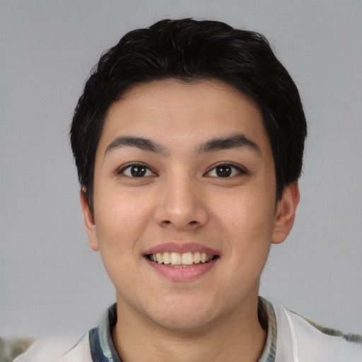 Joyful asian young-adult female with short  black hair and brown eyes