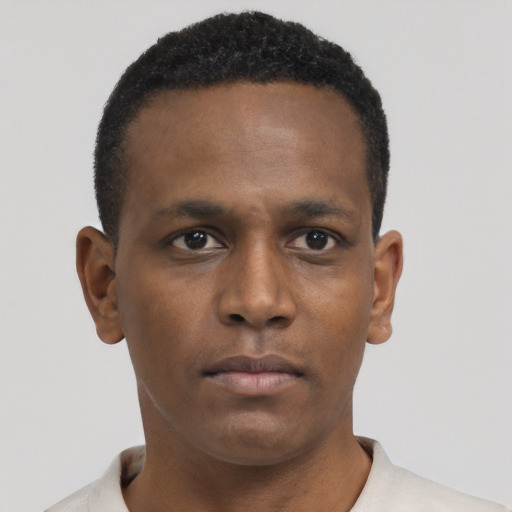 Neutral black young-adult male with short  brown hair and brown eyes