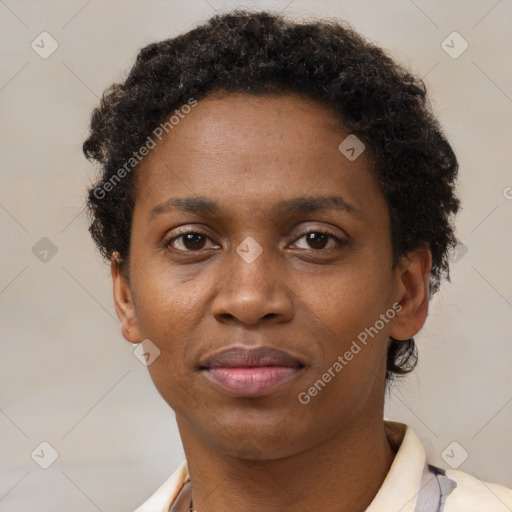 Joyful black adult female with short  brown hair and brown eyes