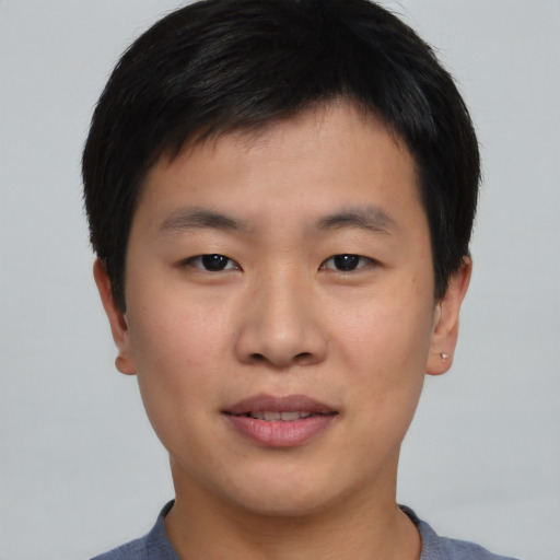 Neutral asian young-adult male with short  brown hair and brown eyes