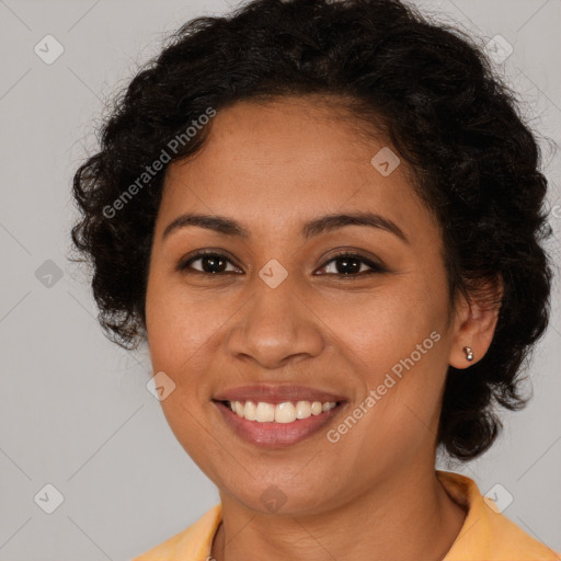 Joyful latino young-adult female with long  brown hair and brown eyes