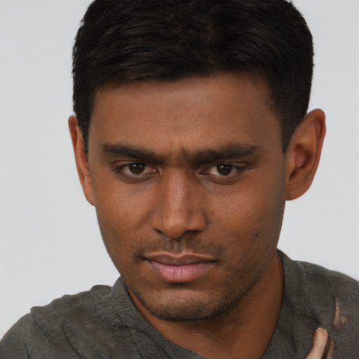 Neutral white young-adult male with short  black hair and brown eyes