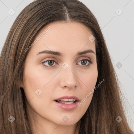 Neutral white young-adult female with long  brown hair and brown eyes