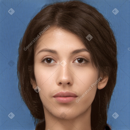 Neutral white young-adult female with long  brown hair and brown eyes