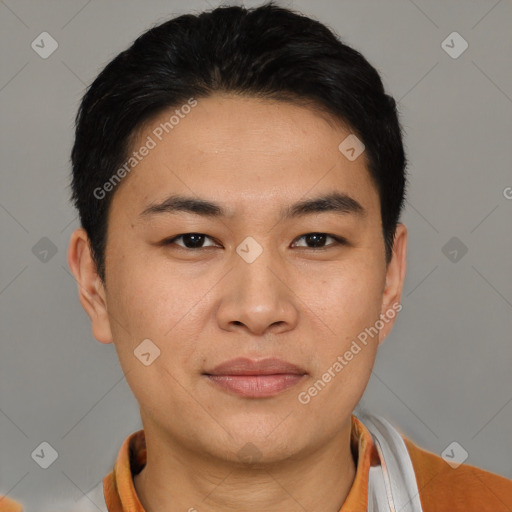 Joyful asian young-adult male with short  brown hair and brown eyes