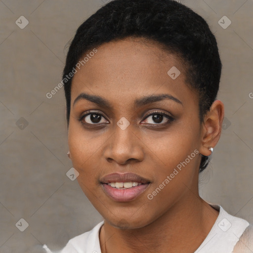 Joyful black young-adult female with short  black hair and brown eyes