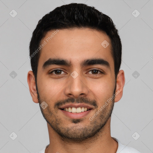 Joyful latino young-adult male with short  black hair and brown eyes