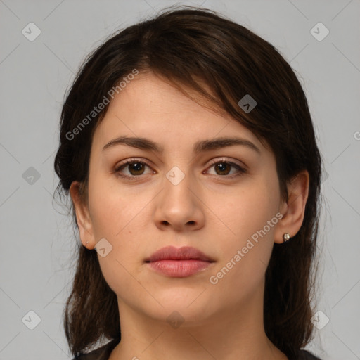 Neutral white young-adult female with medium  brown hair and brown eyes